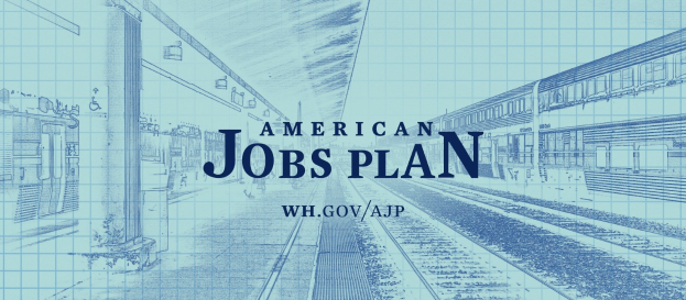 Entwurf einer Bahnstation mit der Beschriftung "American Jobs Plan" und einem Zug auf der rechten Seite