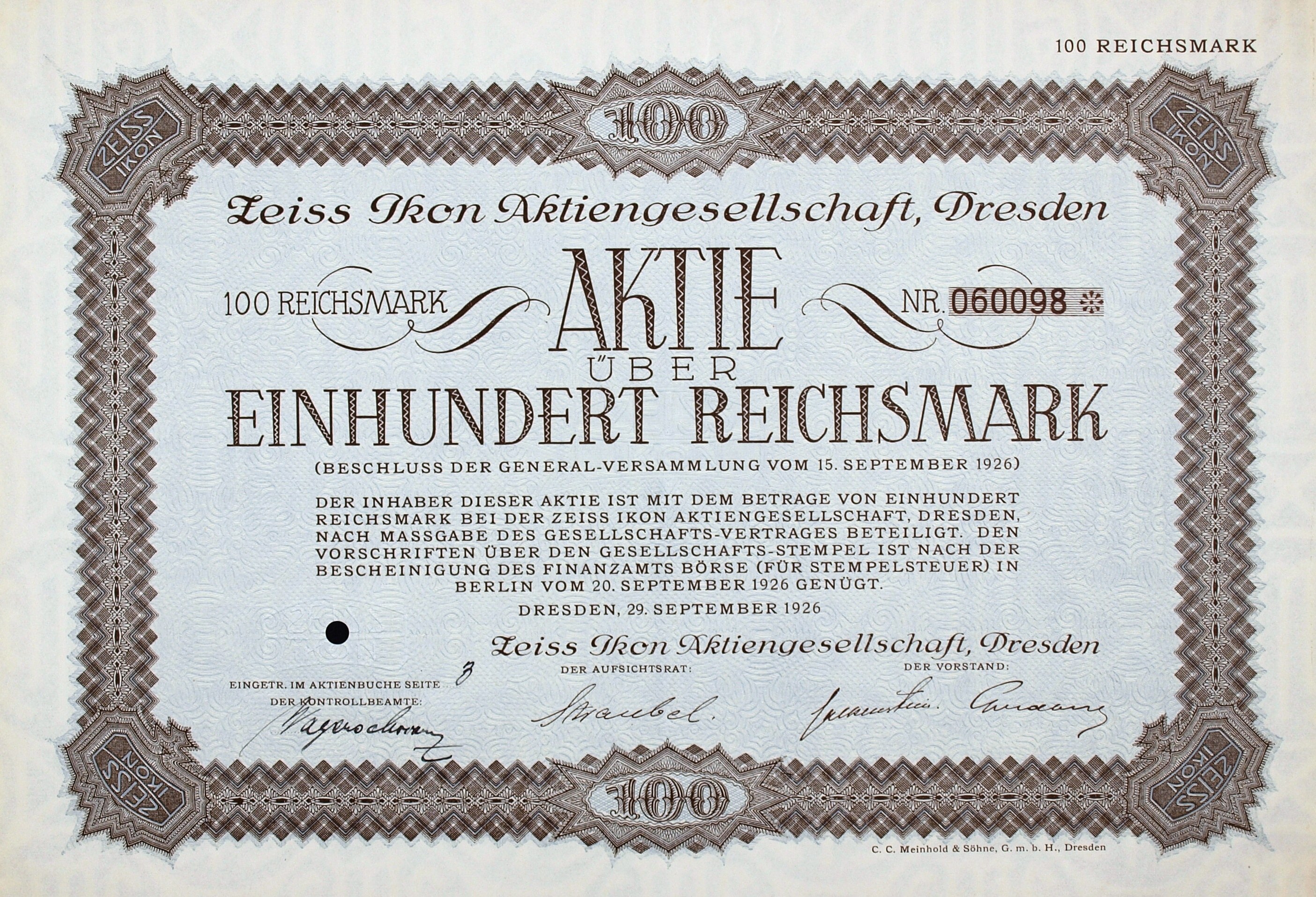 Altes deutsches Aktienzertifikat über 100 Reichsmark mit schwarzem Rand und deutschem Text.