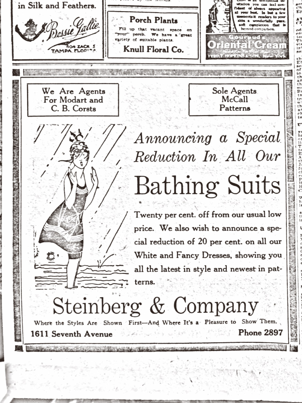 Eine Frau in einem weißen Rollkragenpullover mit langen Ärmeln und einem Dutt, die in der Mitte einer Werbung für Steinberg & Company's Badesachen steht, umgeben von Text.