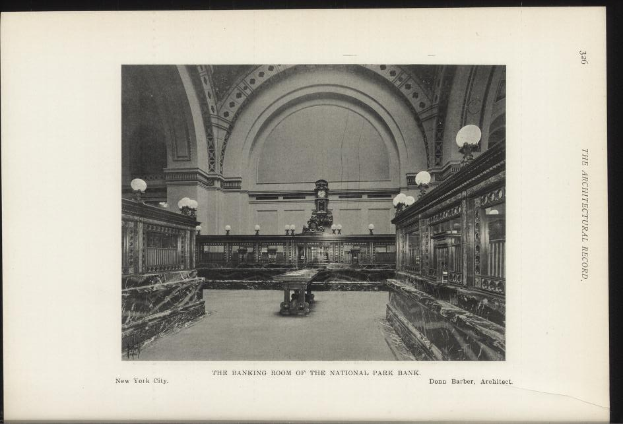 Ein Schwarz-Weiß-Foto der Bankfiliale des National Park Bank in New York City, das Tische, Lampen, eine Wanduhr und Text am unteren Rand zeigt.