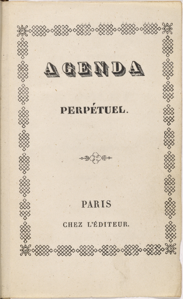 Ein offenes Buch mit den Worten "Agenda Perpetuel Paris" darauf gegen einen weißen Hintergrund.